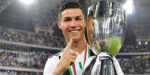 Cristiano Ronaldo still number one holding his first trophy with Juventus