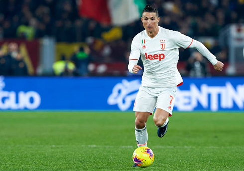 Cristiano Ronaldo moving the ball forward in full throttle