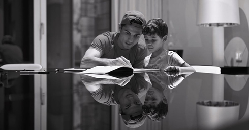 Cristiano Ronaldo studying with his son