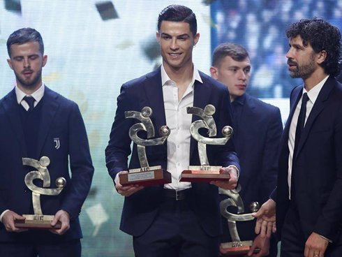 Cristiano Ronaldo receiving trophies