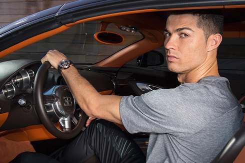 Cristiano Ronaldo driving an expensive car