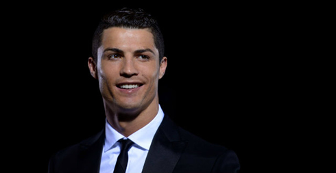 Cristiano Ronaldo wearing a suit and a tie