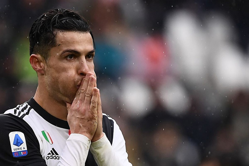 Cristiano Ronaldo praying on the pitch