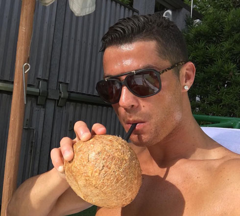 Cristiano Ronaldo drinking coconut water