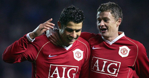 Cristiano Ronaldo next to Ole Gunnar Solskjaer