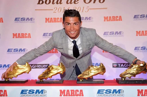 Cristiano Ronaldo showing off his 4 Golden Shoes