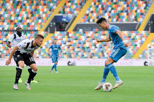 Cristiano Ronaldo trying to distract a defender with showboating tricks