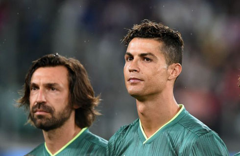 Andrea Pirlo next to Cristiano Ronaldo