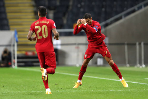 Cristiano Ronaldo celebrates his 100th goal for Portugal