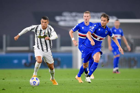 Cristiano Ronaldo racing with the ball