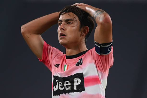 Paulo Dybala raises his hands to his head