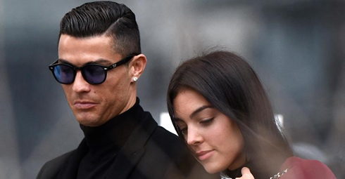 Cristiano Ronaldo next to Georgina Rodriguez