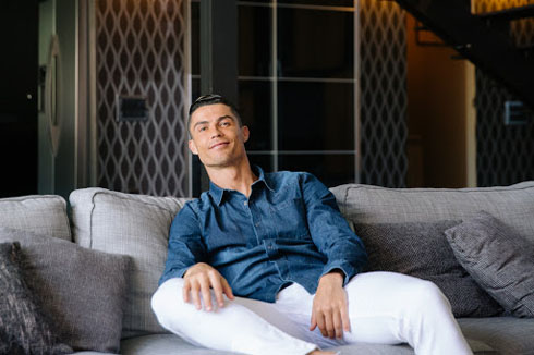 Cristiano Ronaldo relaxed on his sofa