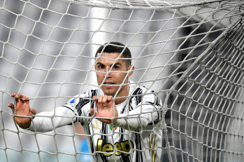 Cristiano Ronaldo pushing the back of the net