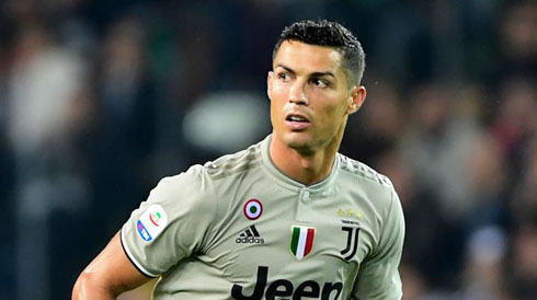 Cristiano Ronaldo playing in a Juventus grey shirt