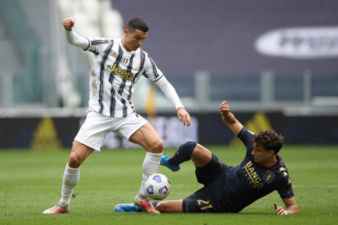 Cristiano Ronaldo getting tackled in Juventus vs Genoa