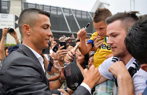 Cristiano Ronaldo signing autographs