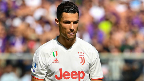 Cristiano Ronaldo playing in a white Juventus shirt