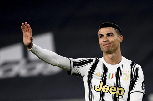 Cristiano Ronaldo raising his hand to apologise