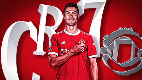 Cristiano Ronaldo holding Manchester United badge