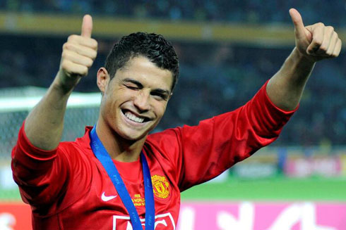 Cristiano Ronaldo after winning a trophy for Man United
