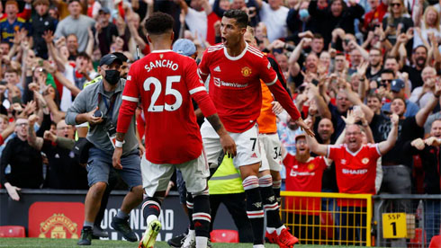 Cristiano Ronaldo does his trademark goal celebration at Old Trafford