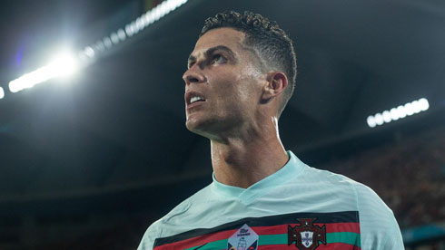 Cristiano Ronaldo playing for Portugal in a white shirt