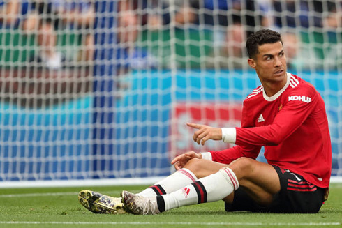 Cristiano Ronaldo sitting on the pitch