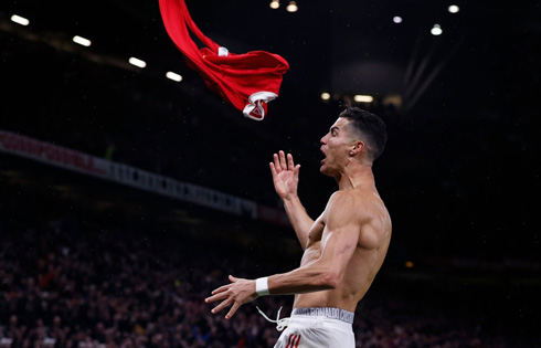 Cristiano Ronaldo throws his shirt during a game