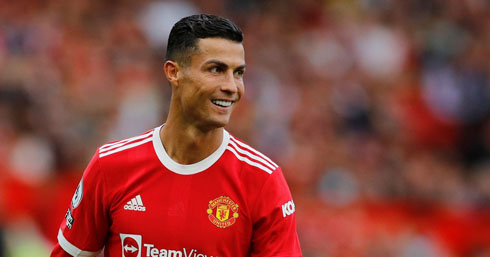 Cristiano Ronaldo smiling during a Man Utd game in 2021