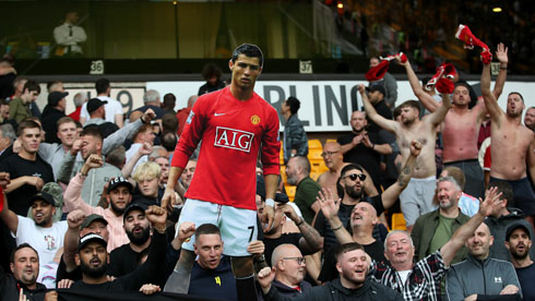 Fans holding a Cristiano Ronaldo sign