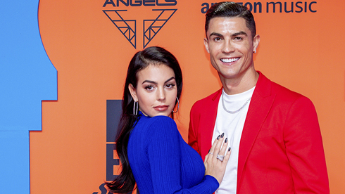 Cristiano Ronaldo and Georgina posing for a photo