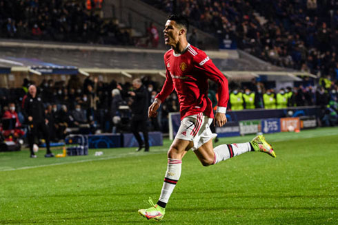 Cristiano Ronaldo runs to the corner flag after scoring