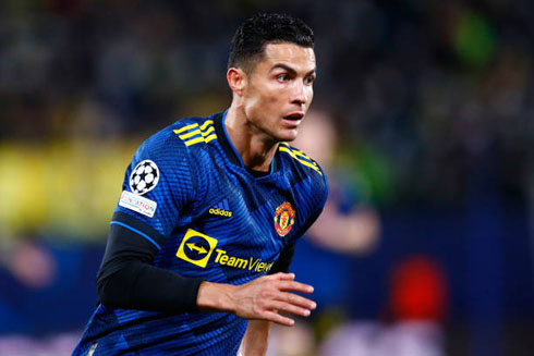 Cristiano Ronaldo playing for United in a blue jersey