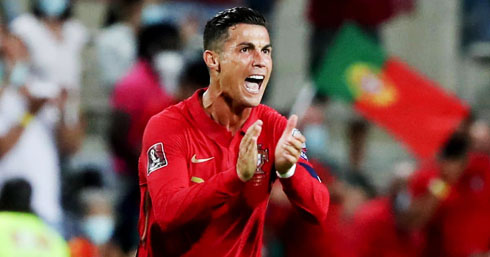 Cristiano Ronaldo giving his support to his teammates from the bench