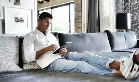 Cristiano Ronaldo relaxing in his couch