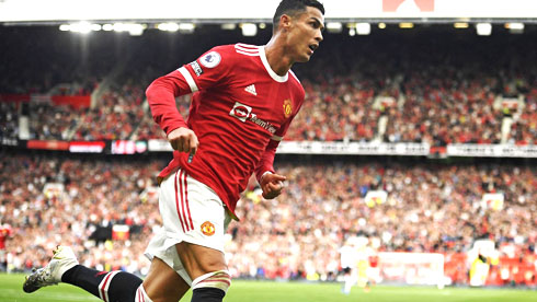Cristiano Ronaldo running across the pitch at Old Trafford