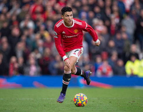 Cristiano Ronaldo moving the ball forward in a game for Man Utd
