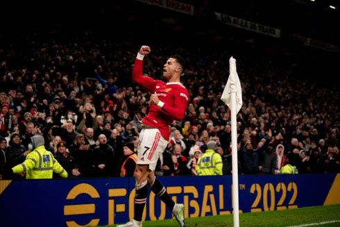 Cristiano Ronaldo celebrates goal next to United fans