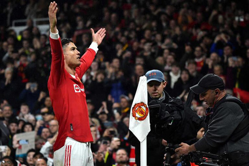 Cristiano Ronaldo raises his arms towards Man Utd fans