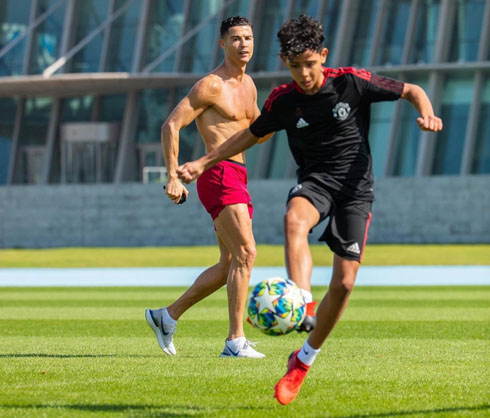 Cristiano Ronaldo Junior playing with his father