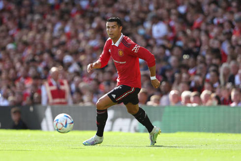 Cristiano Ronaldo moving the ball forward for United