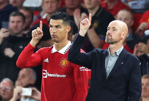 Cristiano Ronaldo on the sideline next to Erik ten Hag