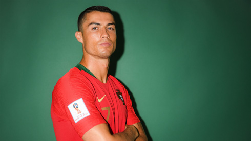 Cristiano Ronaldo wallpaper in a green background