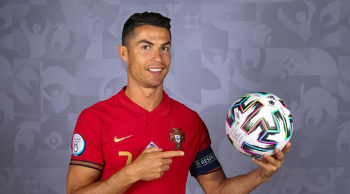 Cristiano Ronaldo holding World Cup ball
