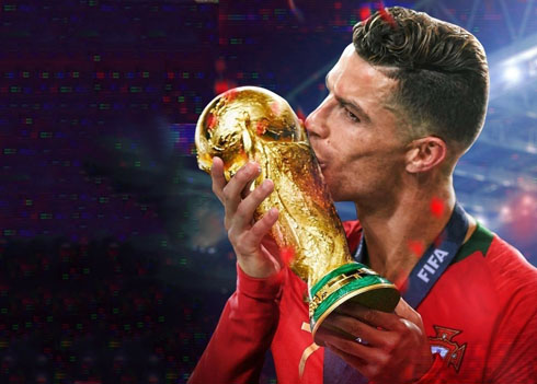Cristiano Ronaldo kissing the World Cup trophy