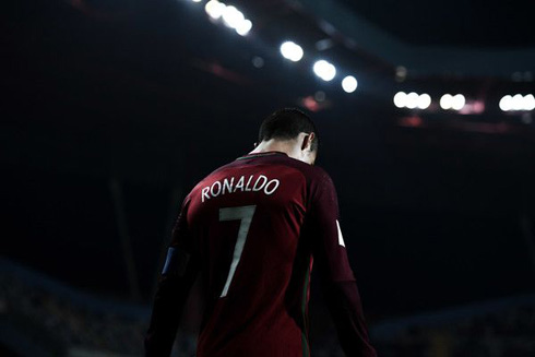 Cristiano Ronaldo walking in the shadow