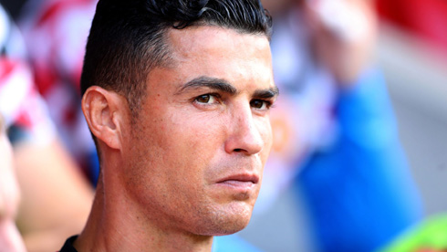Cristiano Ronaldo sits on the bench and gets upset