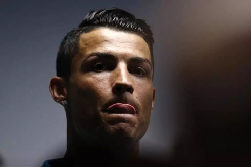 Cristiano Ronaldo looking at someone in the corner
