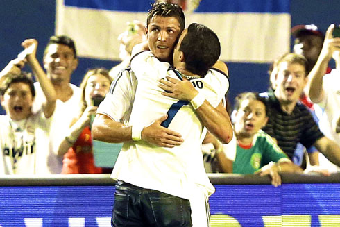 Cristiano Ronaldo hugging a fan in Real Madrid
